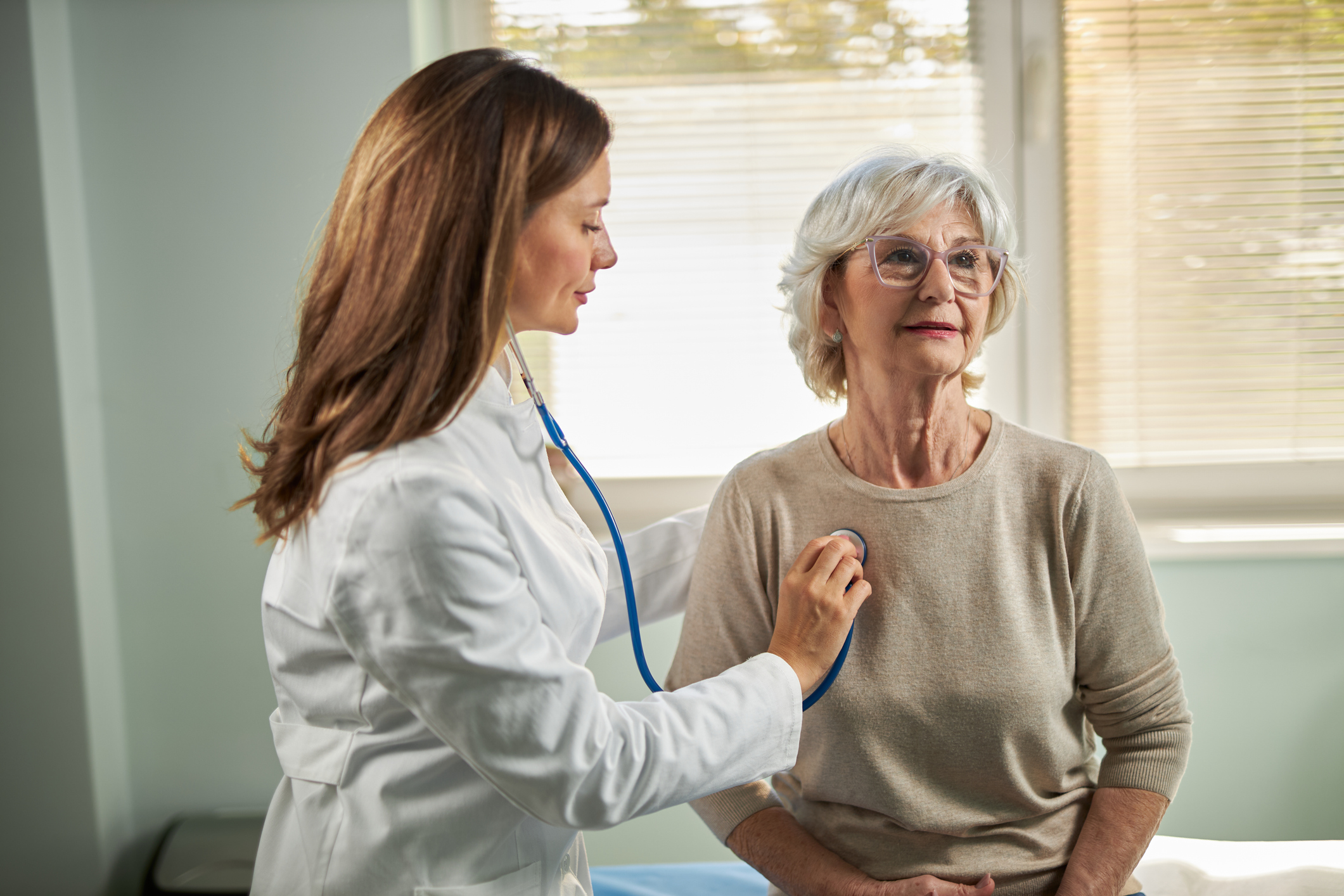 Senior woman with a doctor at the doctor's office