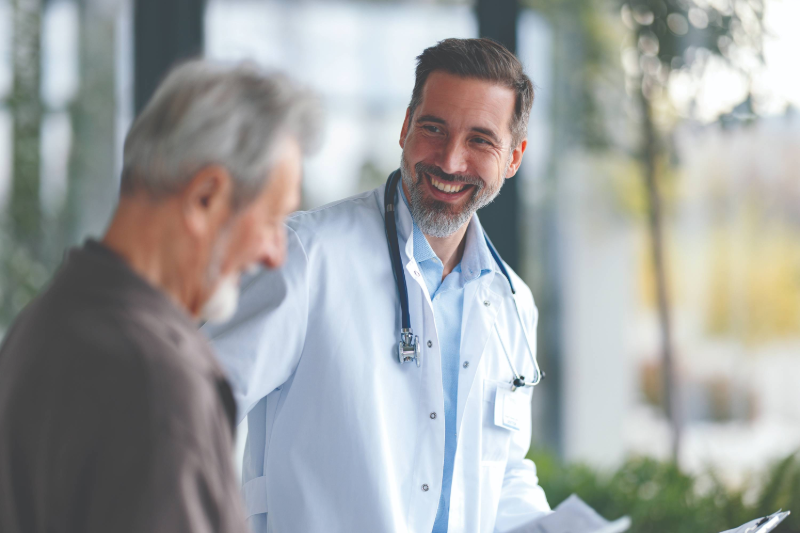 Senior man speaking with a doctor